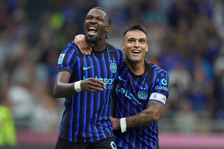 Thuram e Lautaro che festeggiano